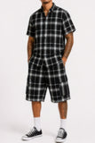 Front full-length view of a model wearing Stylia's men's checkered button-down shirt paired with matching cargo shorts in the US.